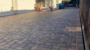 Custom front walkway and driveway made from paver stones. Installed at South Florida home
